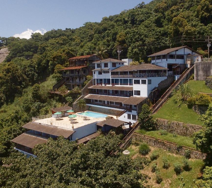 an aerial view of a house on a hill at Pousada Ponta do Leste in Angra dos Reis