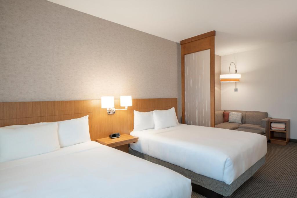 Ein Bett oder Betten in einem Zimmer der Unterkunft Hyatt Place Sandestin at Grand Blvd