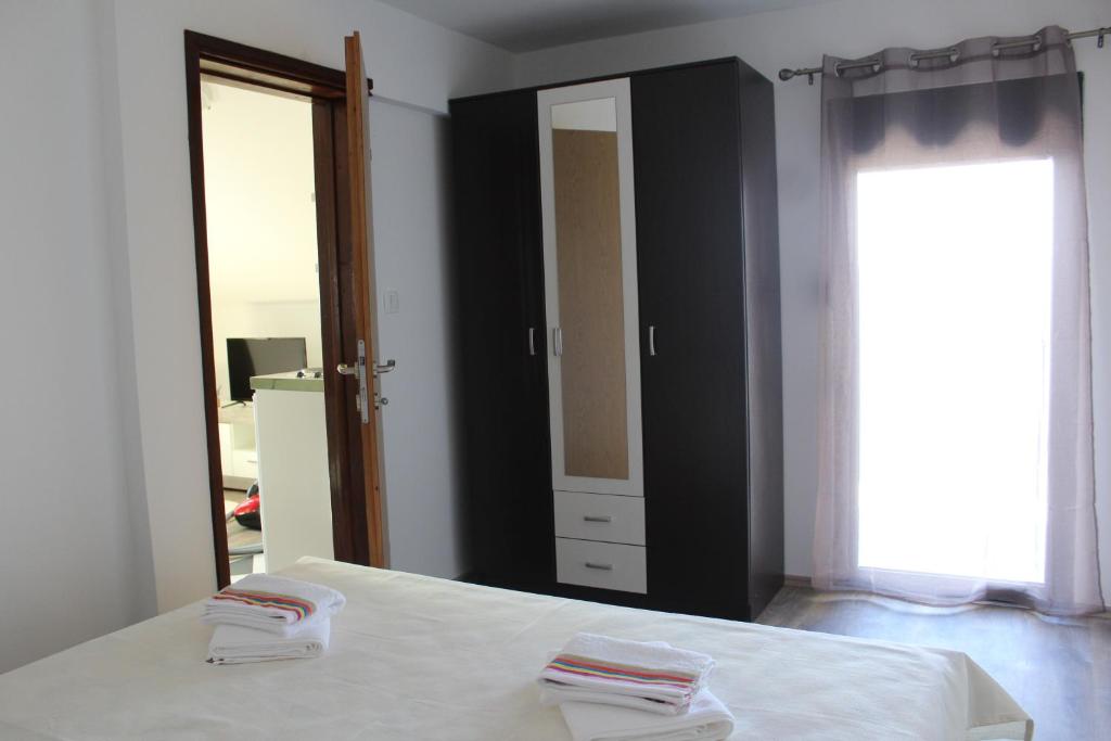 Postel nebo postele na pokoji v ubytování Forest Apartments