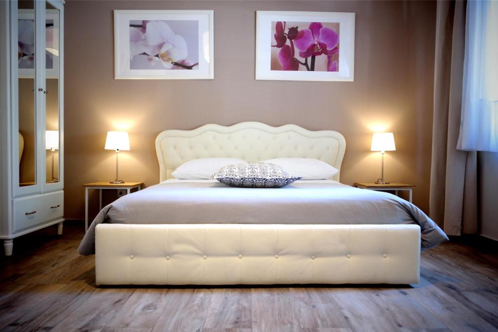 Łóżko lub łóżka w pokoju w obiekcie Villa di Nera B&B