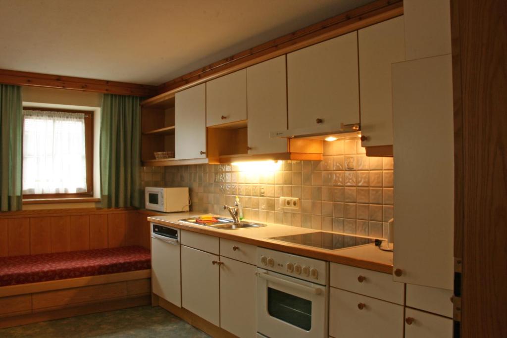 Kuchyňa alebo kuchynka v ubytovaní Appartement Mox