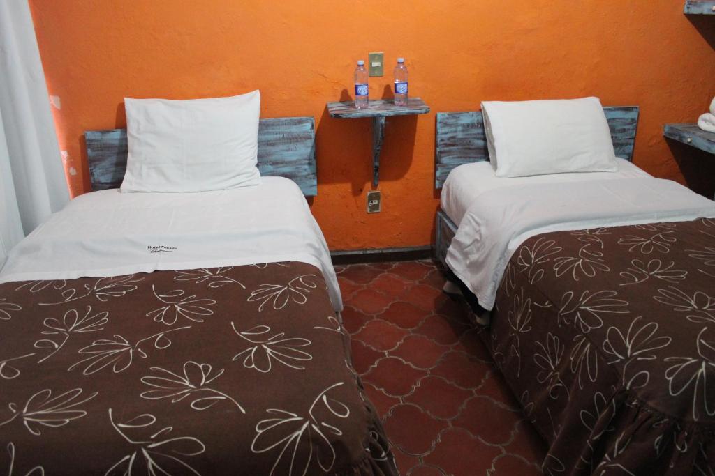 Postel nebo postele na pokoji v ubytování Hotel Posada Chamacuero