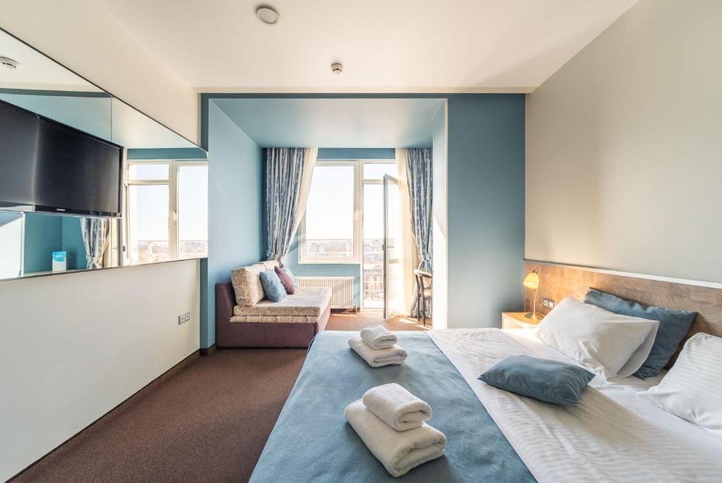 Postel nebo postele na pokoji v ubytování Mini-hotel People