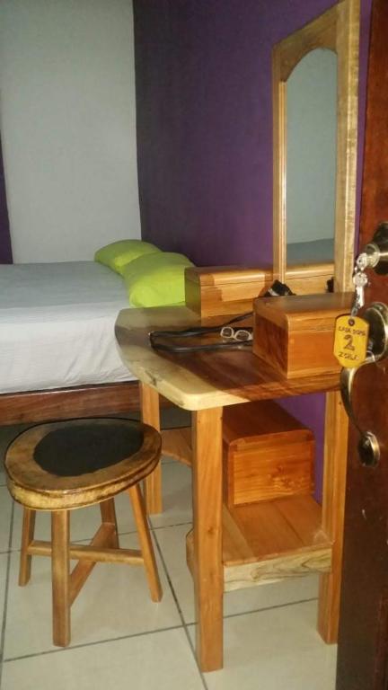 Postel nebo postele na pokoji v ubytování Hotel & Hostal Yaxkin Copan