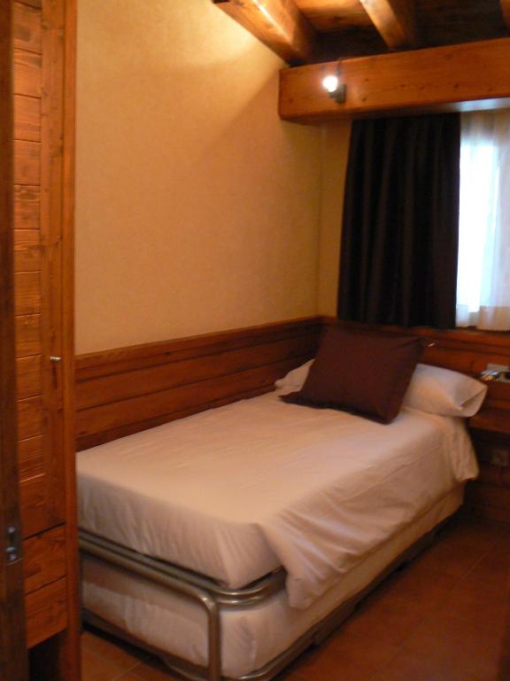 Postel nebo postele na pokoji v ubytování Aparthotel Bellver