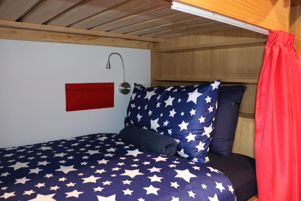 Postel nebo postele na pokoji v ubytování Adventure Q2 Hostel