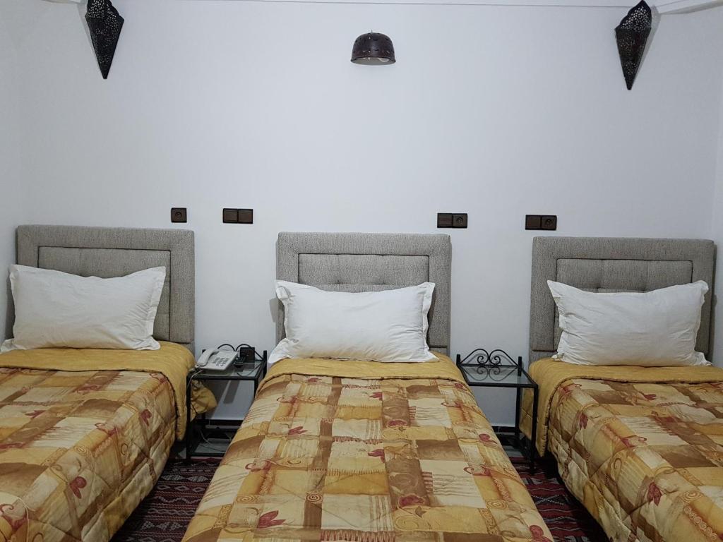 Postel nebo postele na pokoji v ubytování Riad Assia