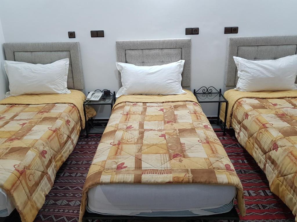 Postel nebo postele na pokoji v ubytování Riad Assia