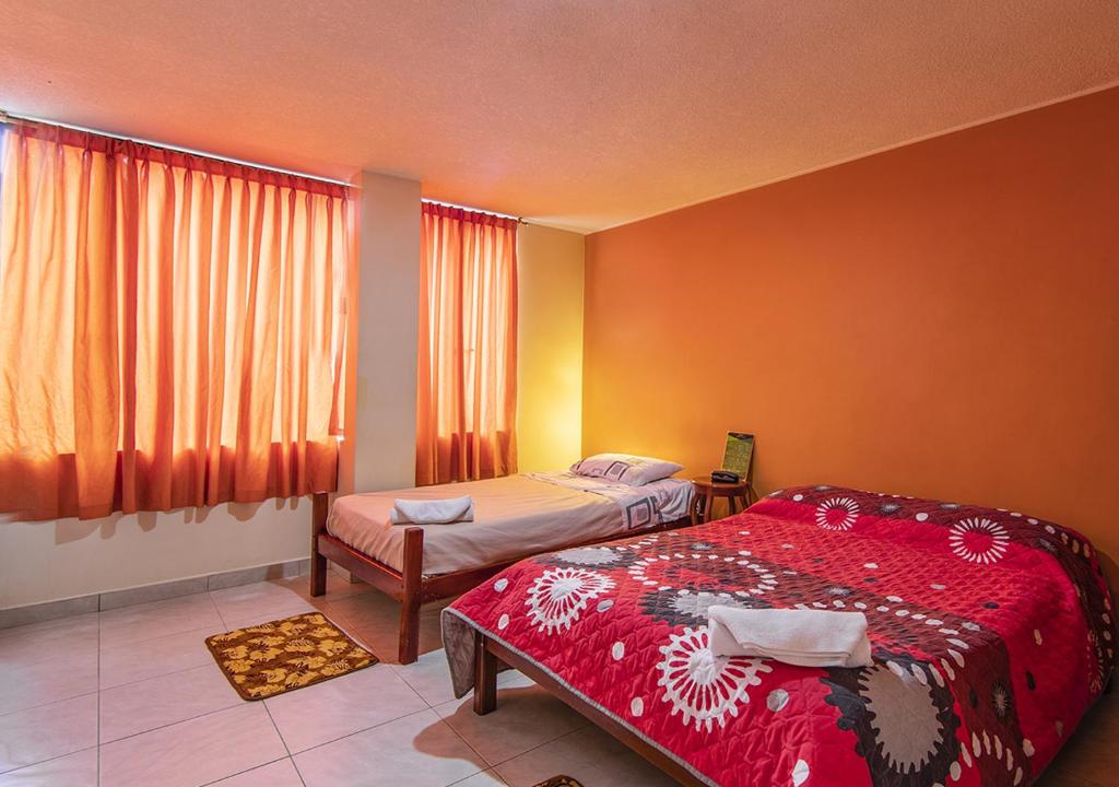 Postel nebo postele na pokoji v ubytování Hostal Oro Orense
