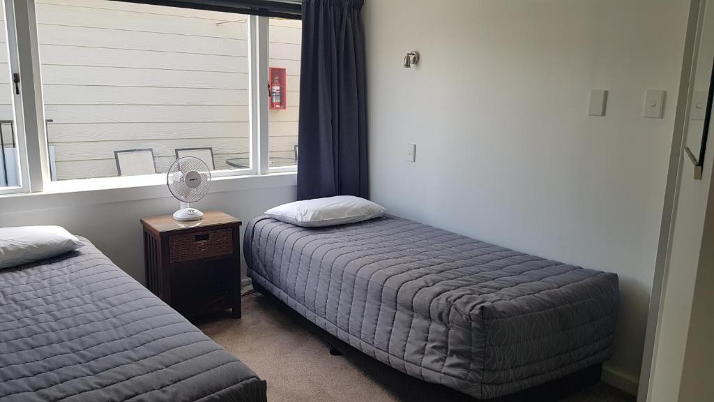 Postel nebo postele na pokoji v ubytování Accent On Taupo Motor Lodge