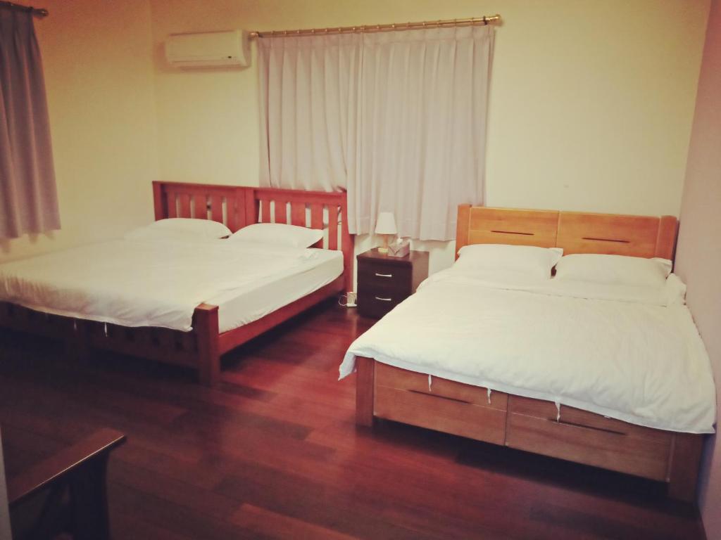 Postel nebo postele na pokoji v ubytování manor