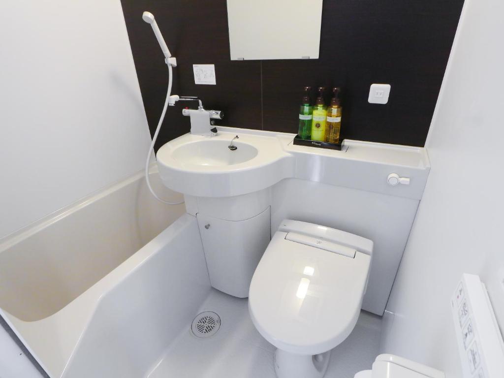 Koupelna v ubytování HOTEL LiVEMAX Kayabacho