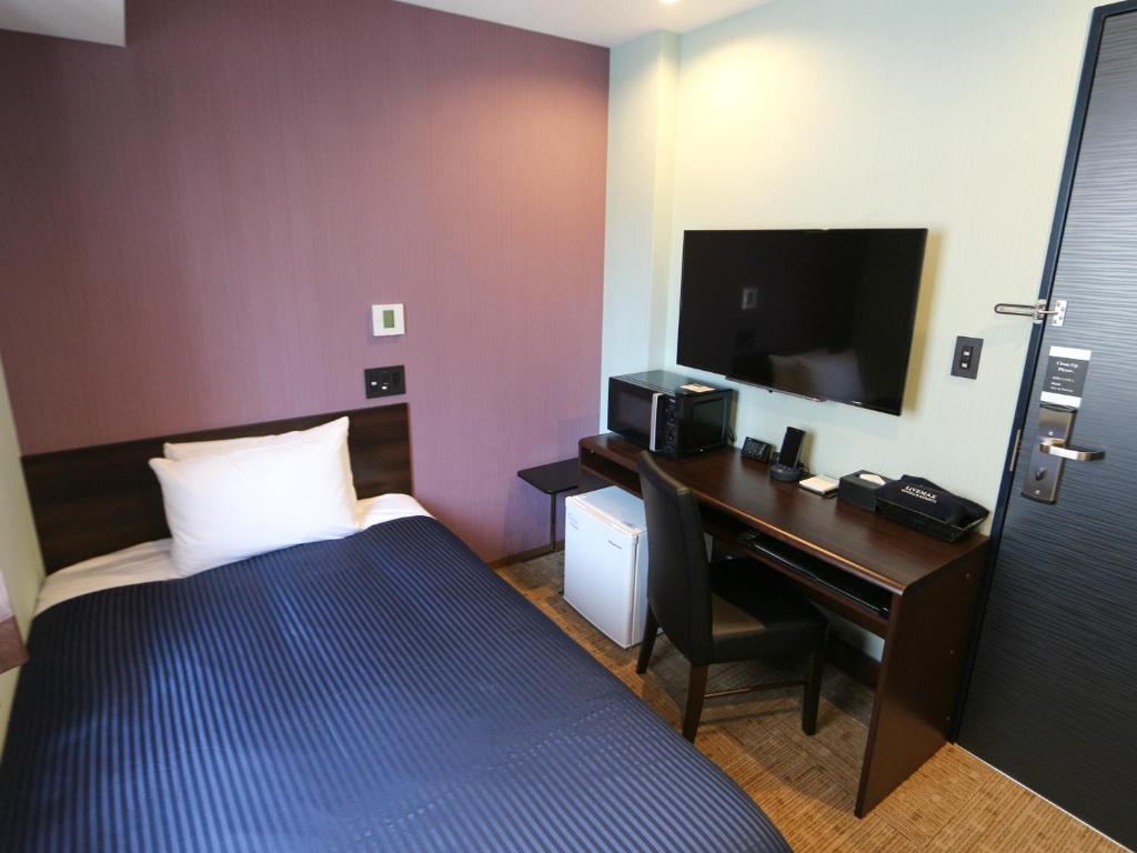 TV a/nebo společenská místnost v ubytování HOTEL LiVEMAX Asakusabashi-Eki Kitaguchi