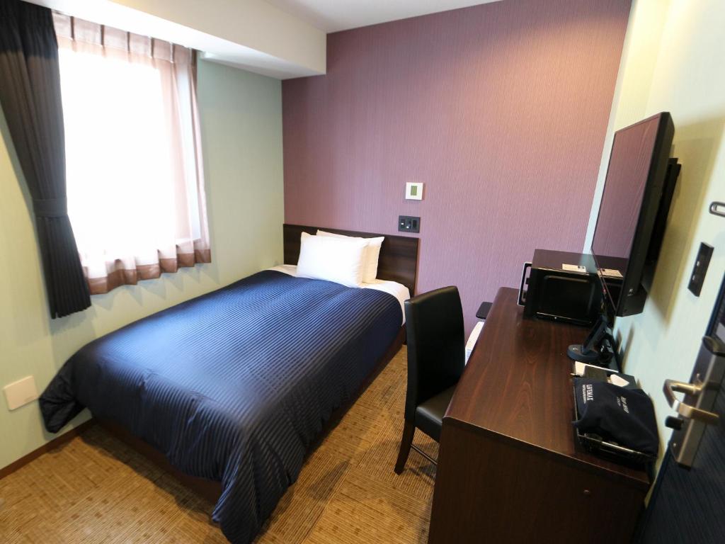 TV a/nebo společenská místnost v ubytování HOTEL LiVEMAX Asakusabashi-Eki Kitaguchi