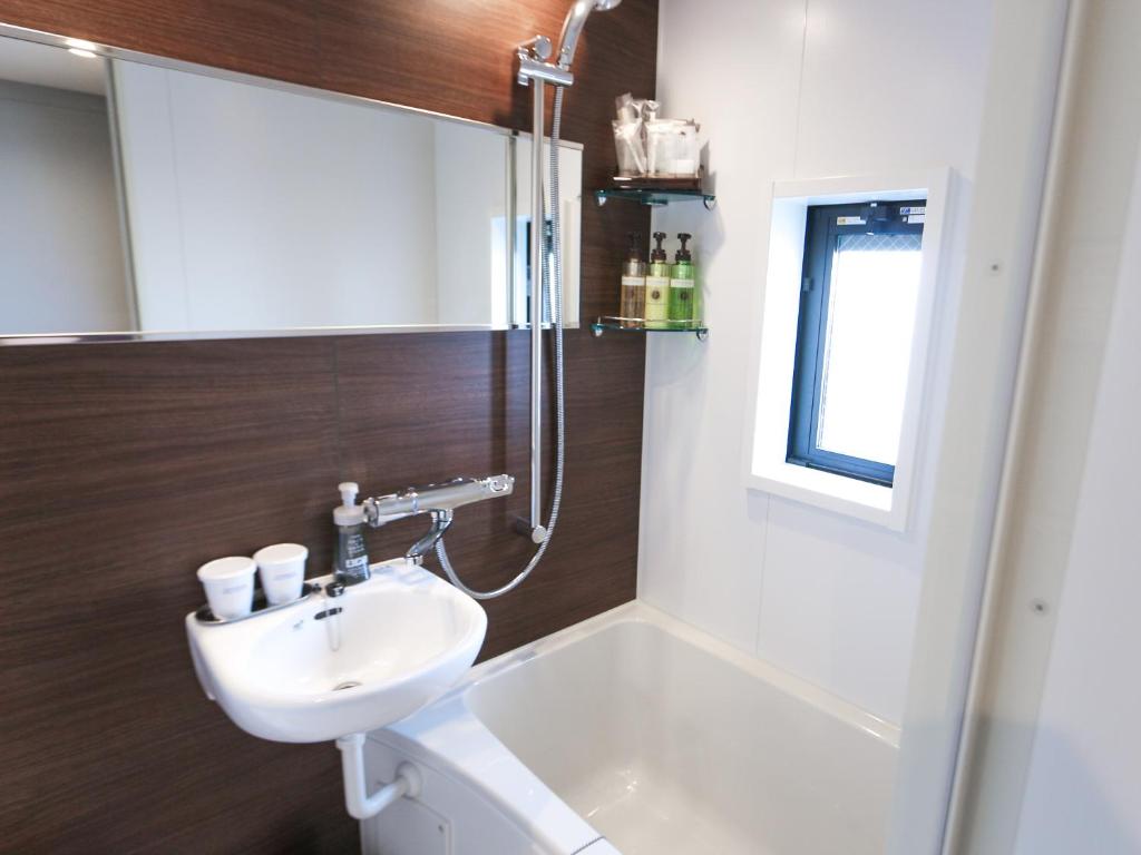 Koupelna v ubytování HOTEL LiVEMAX Tokyo Ayase-Ekimae