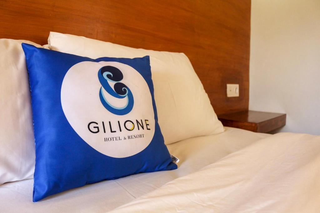 Letto o letti in una camera di Gili One Resort