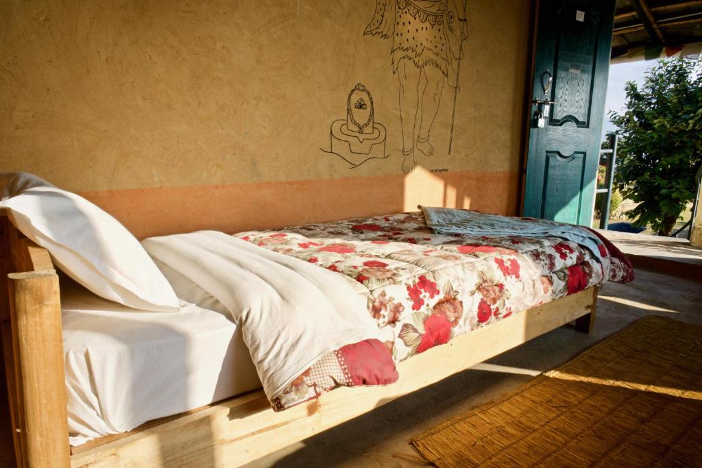 Letto o letti in una camera di Annapurna Eco Village