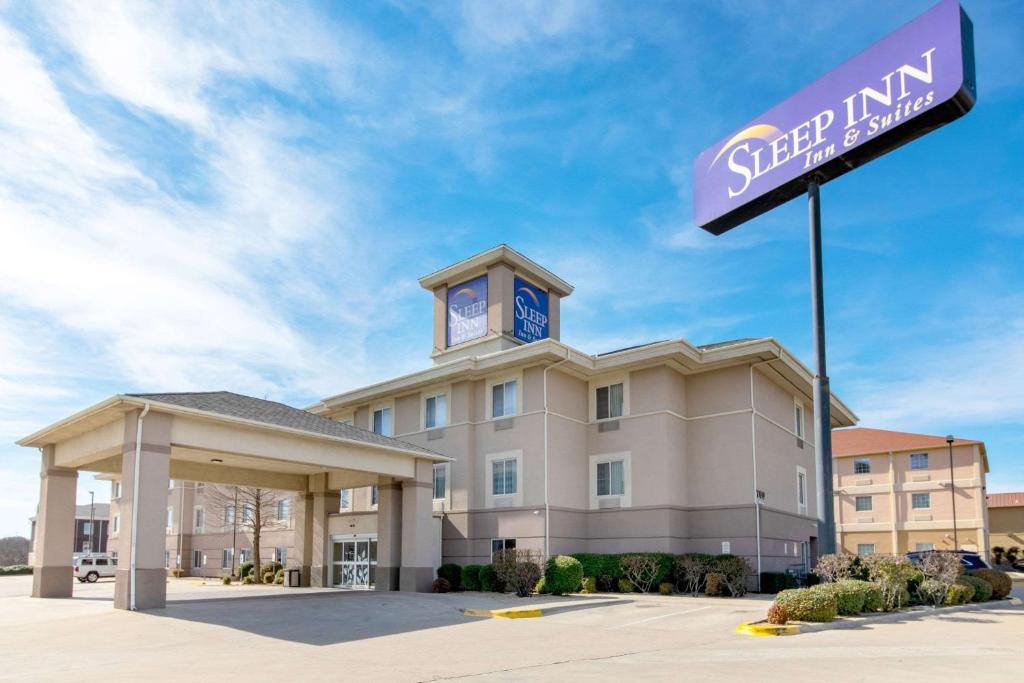 a hotel with a clock tower on top of a building at Sleep Inn & Suites Near Fort Cavazos in Killeen
