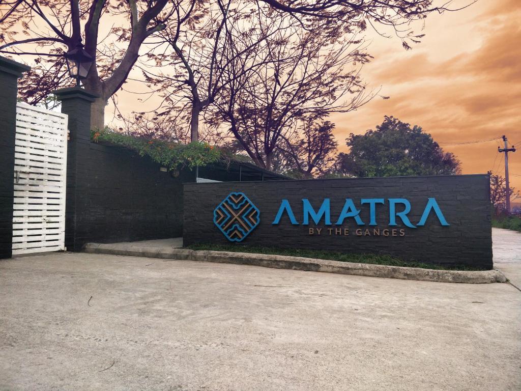 a sign for amirra by the games at Amatra By The Ganges in Haridwār