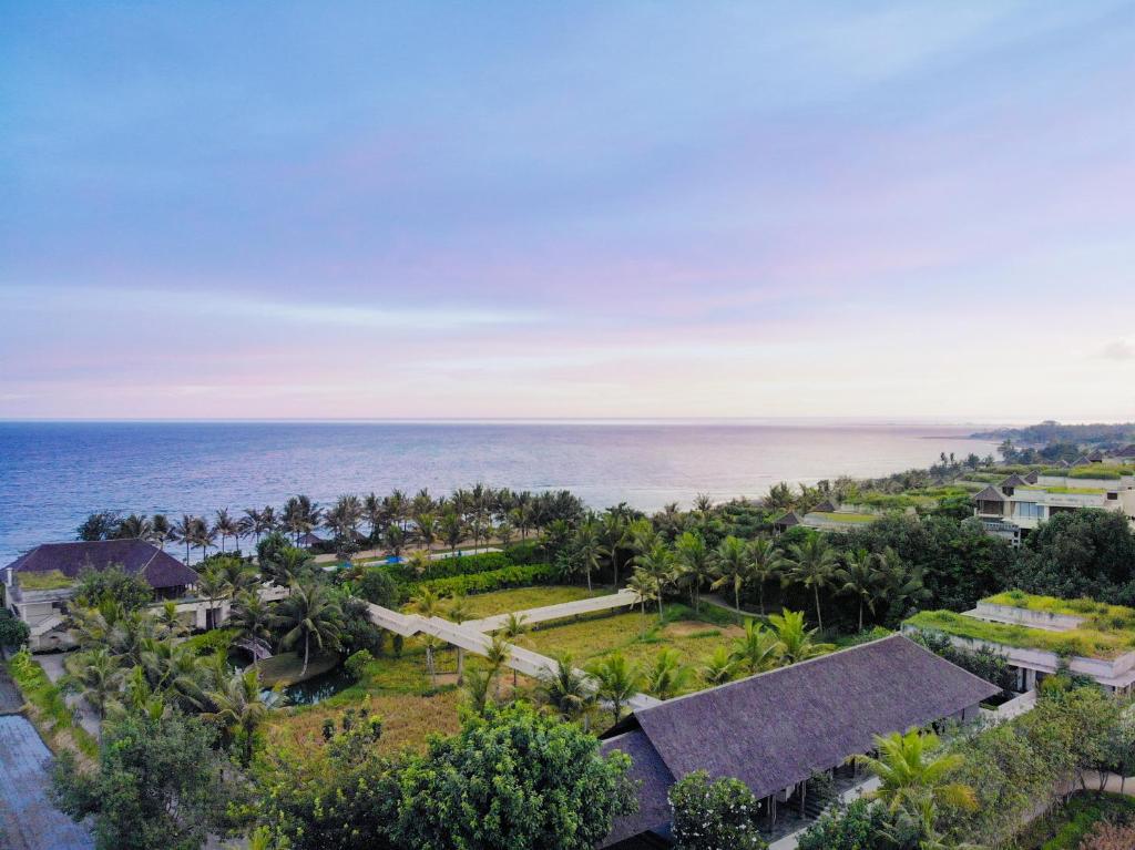 Photo de la galerie de l'établissement Komaneka at Keramas Beach, à Keramas