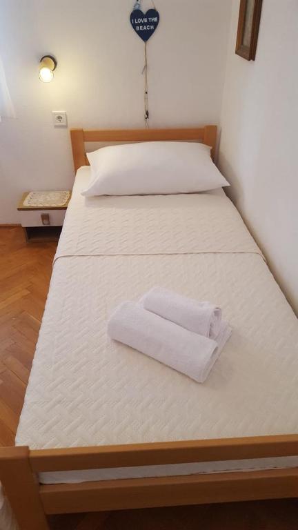 Postel nebo postele na pokoji v ubytování Apartment Petricic
