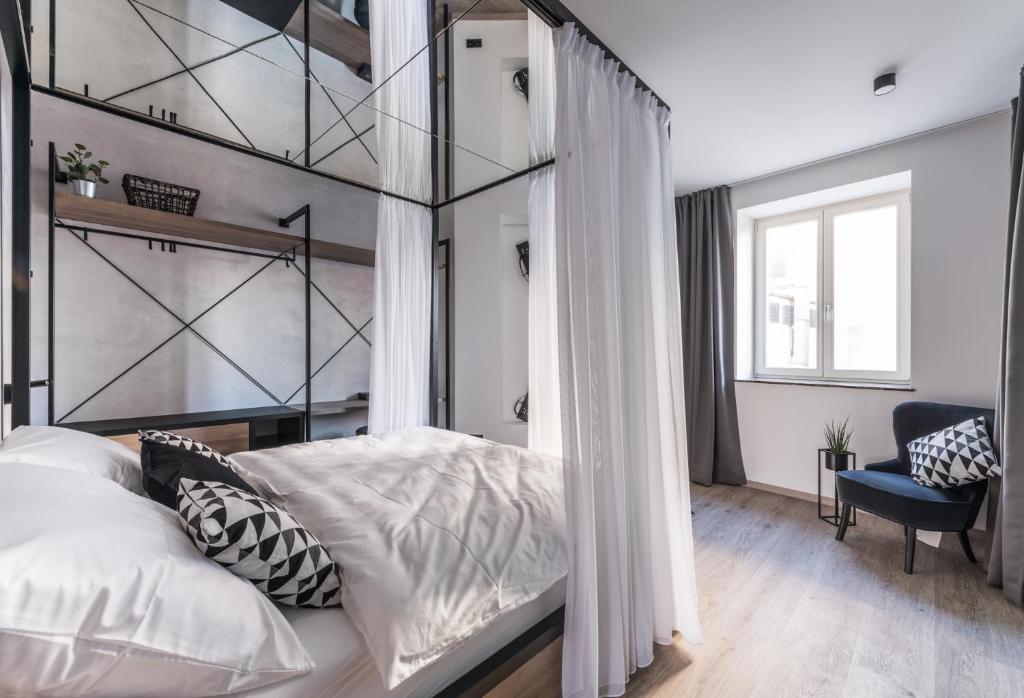 Postel nebo postele na pokoji v ubytování Apartmánový dům U Tomana