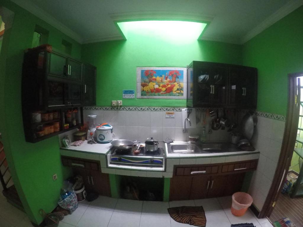 Kuchyň nebo kuchyňský kout v ubytování Dhika Adventure