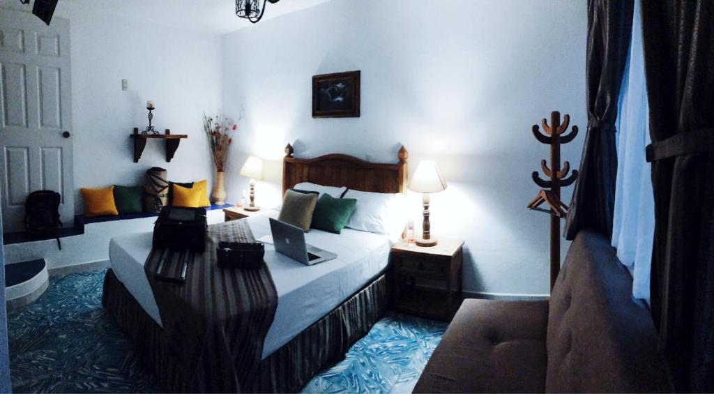 Letto o letti in una camera di Hostal Plaza Central