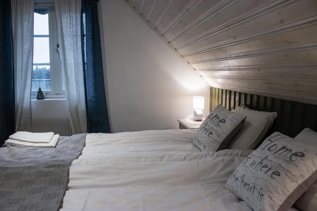 Postel nebo postele na pokoji v ubytování Stora Herrestad B&B