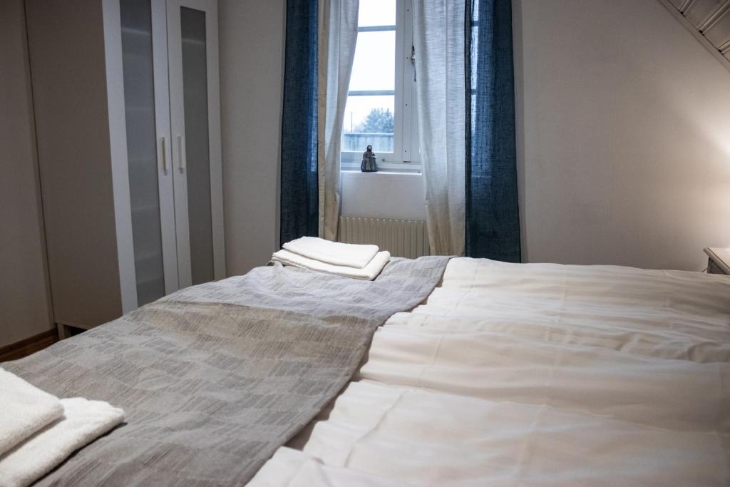 Postel nebo postele na pokoji v ubytování Stora Herrestad B&B