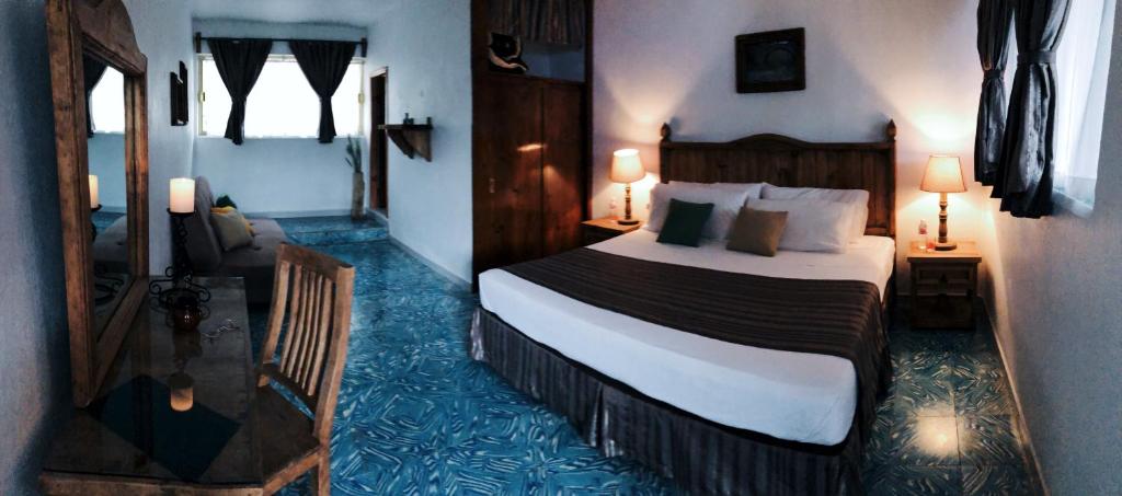 Letto o letti in una camera di Hostal Plaza Central