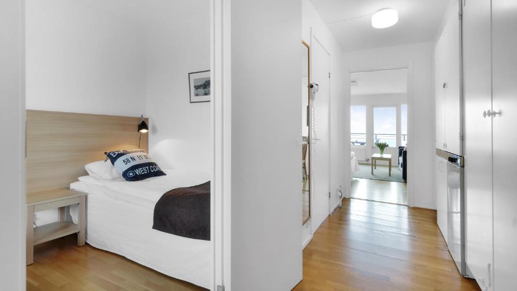 Postel nebo postele na pokoji v ubytování Strand Hotell Borgholm