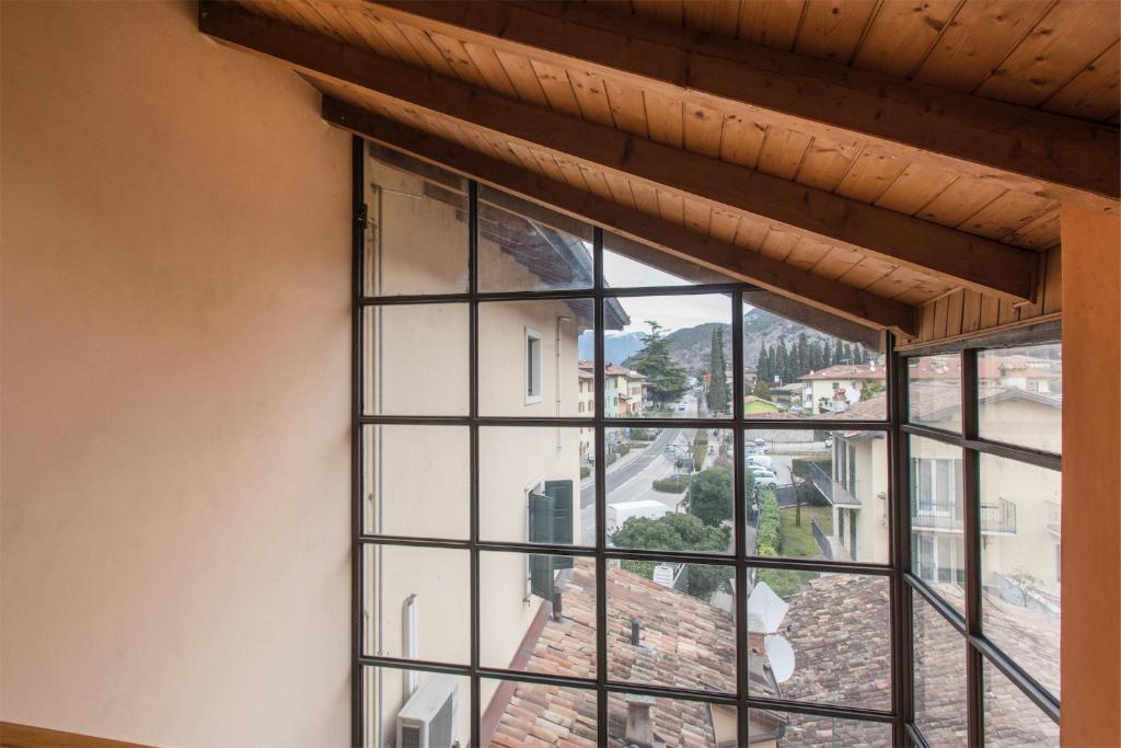 Zdjęcie z galerii obiektu Casa Lidia, la mansarda sul fiume w Arco