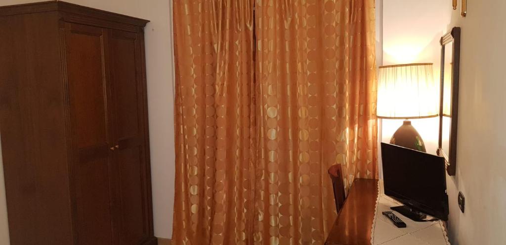 TV a/nebo společenská místnost v ubytování Hotel Vitalba