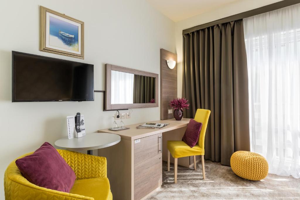 TV i/ili zabavni centar u objektu Hotel Mondo