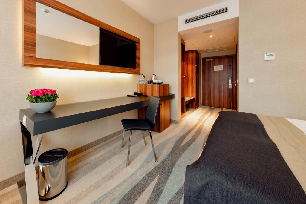 Posteľ alebo postele v izbe v ubytovaní Warsaw Plaza Hotel