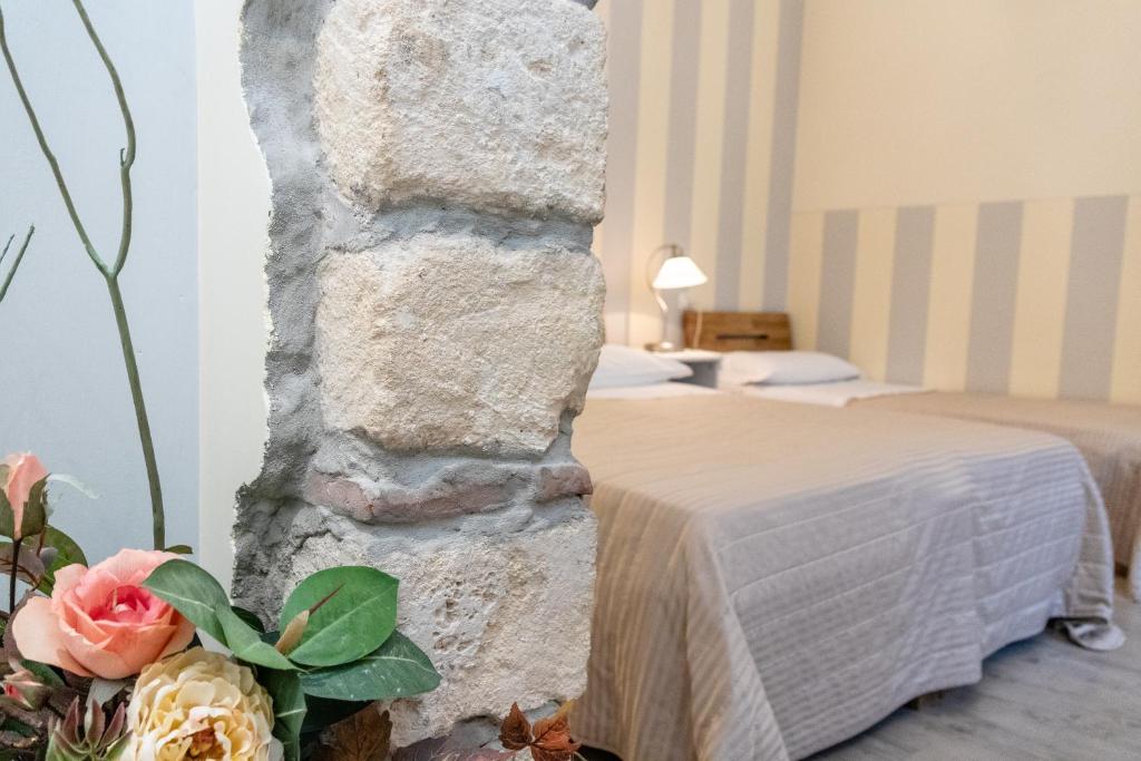 Postel nebo postele na pokoji v ubytování B&B Accademia