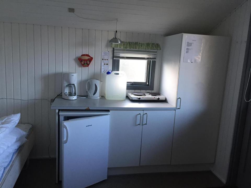Kuchyň nebo kuchyňský kout v ubytování Sdr. Felding camping & hytteby