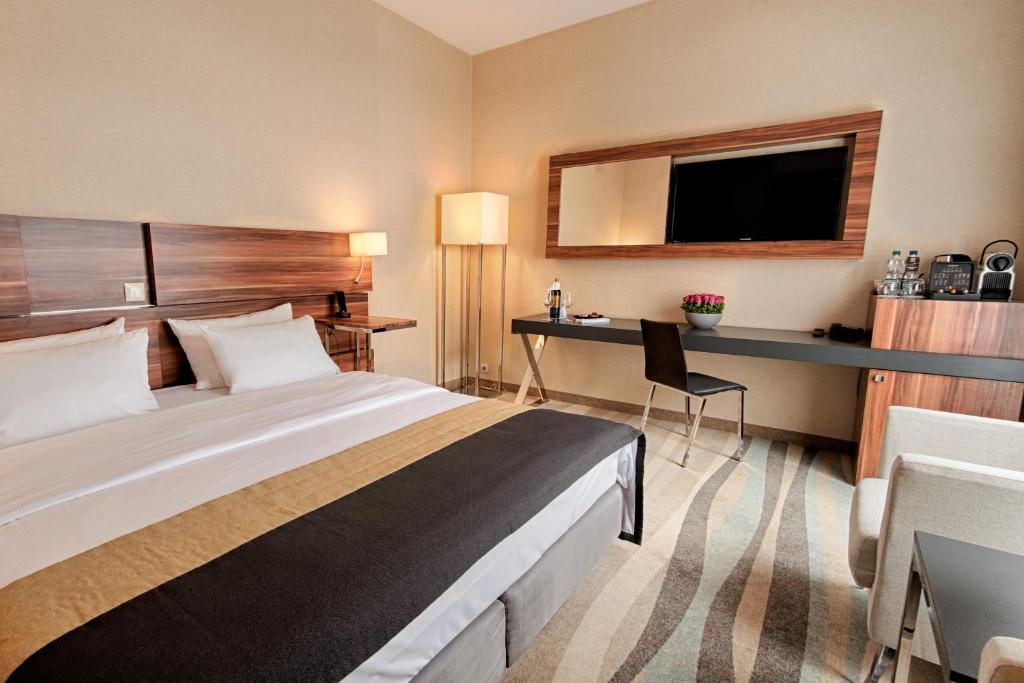 Posteľ alebo postele v izbe v ubytovaní Warsaw Plaza Hotel