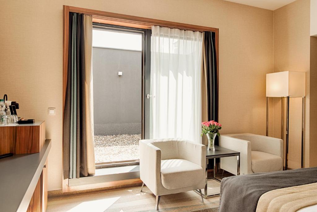 Posteľ alebo postele v izbe v ubytovaní Warsaw Plaza Hotel