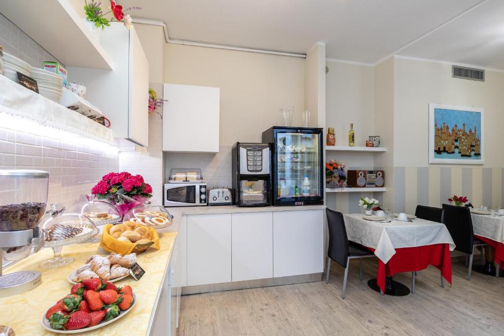 Kuchyň nebo kuchyňský kout v ubytování B&B Accademia