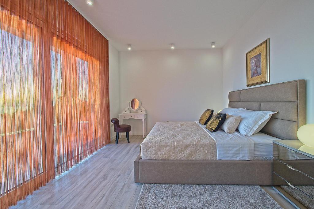 Postel nebo postele na pokoji v ubytování Villa Ulika Makarska
