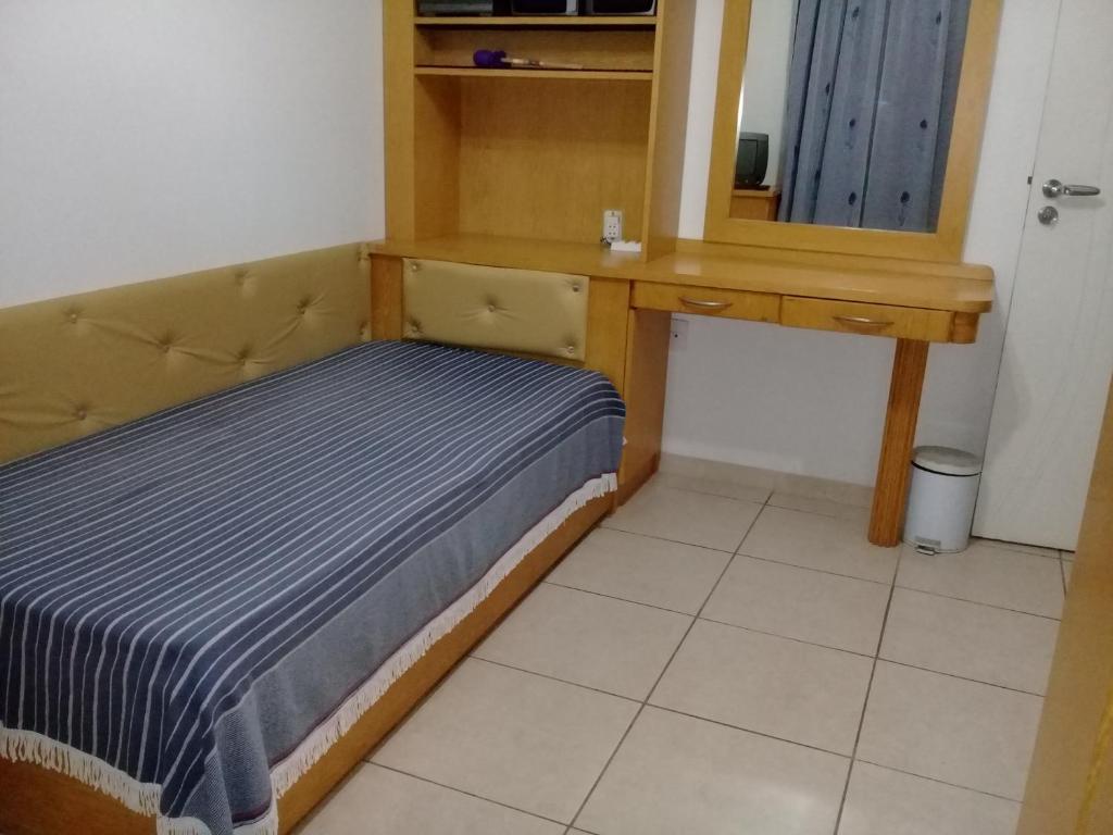 Postel nebo postele na pokoji v ubytování Quarto Privativo Feminino ou Casal