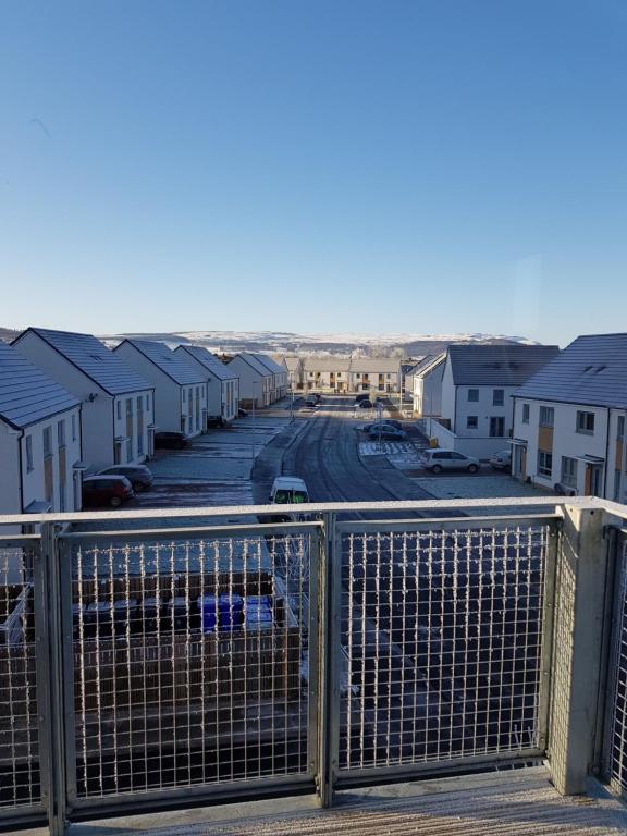 a view from a balcony of a row of houses at 5 Royal View Apartments in Stirling