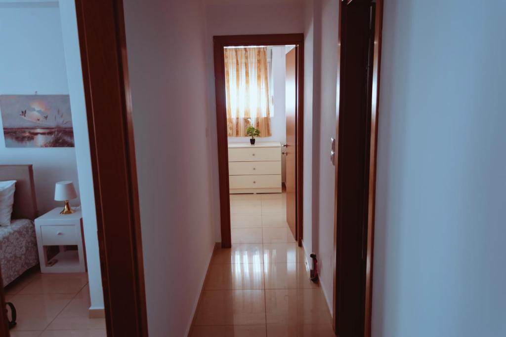 A bed or beds in a room at Sun Βy Τhe Sea 100m from the beach