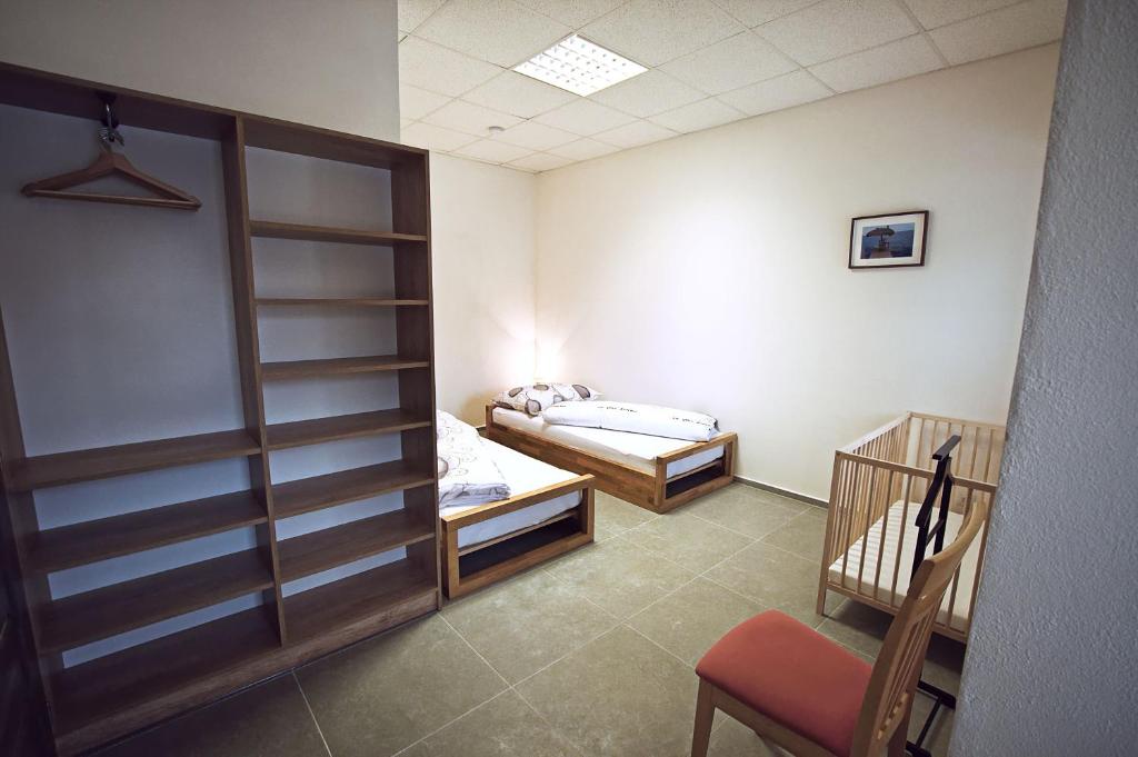 Postel nebo postele na pokoji v ubytování "U Čápa" Krásný apartmán v Sedleci