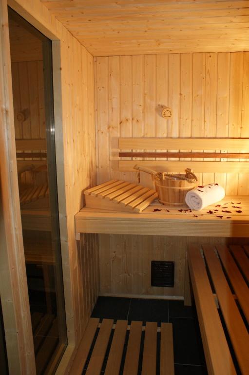Postel nebo postele na pokoji v ubytování Sonnenhotel Soldanella Sonneck