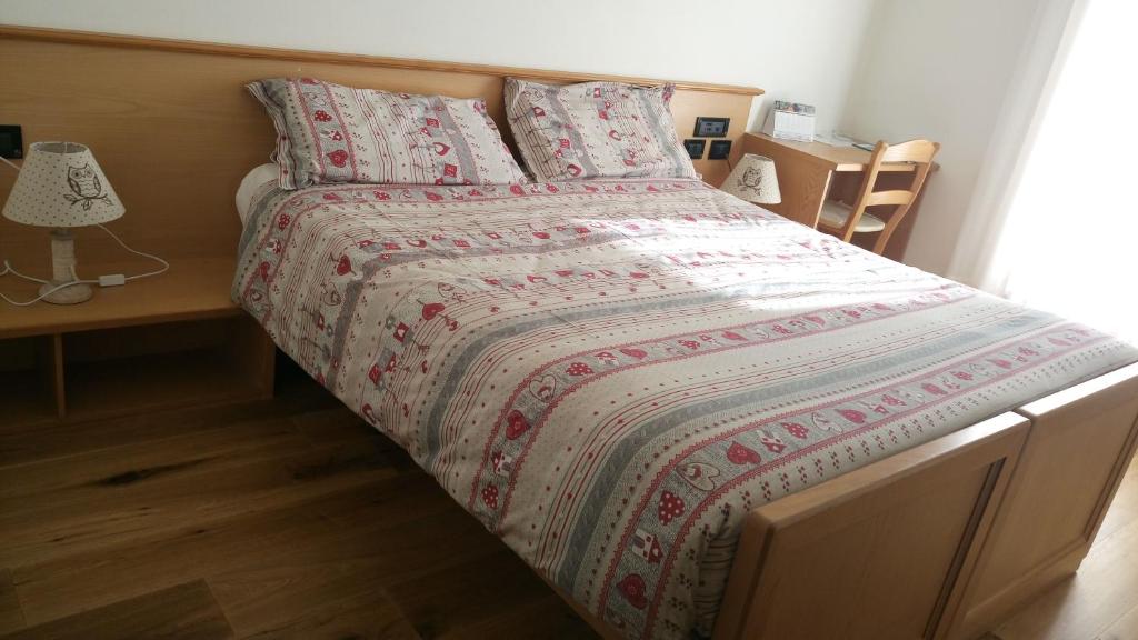 Postel nebo postele na pokoji v ubytování Meublè Rosalpina
