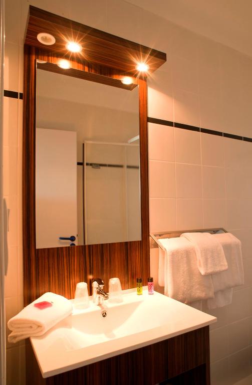 Koupelna v ubytování Hôtel Beau Rivage