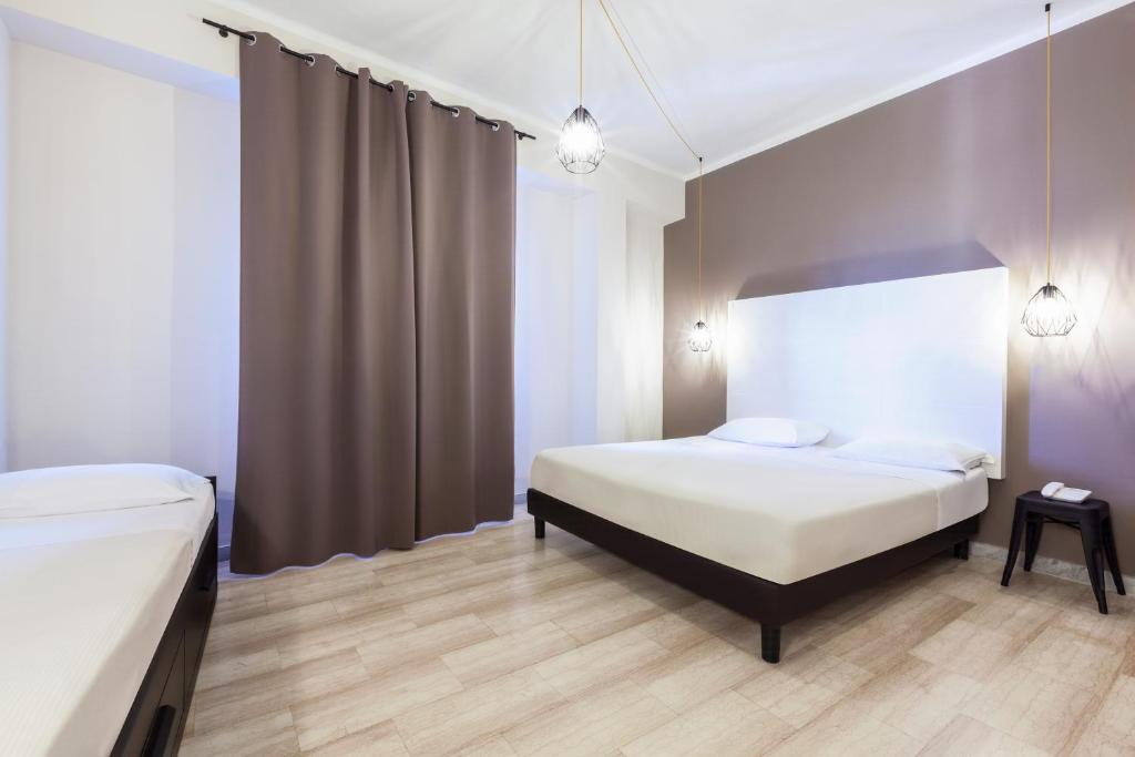 Postel nebo postele na pokoji v ubytování ibis styles Trani